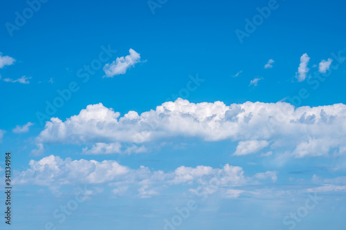 Blue sky background with white clouds  texture