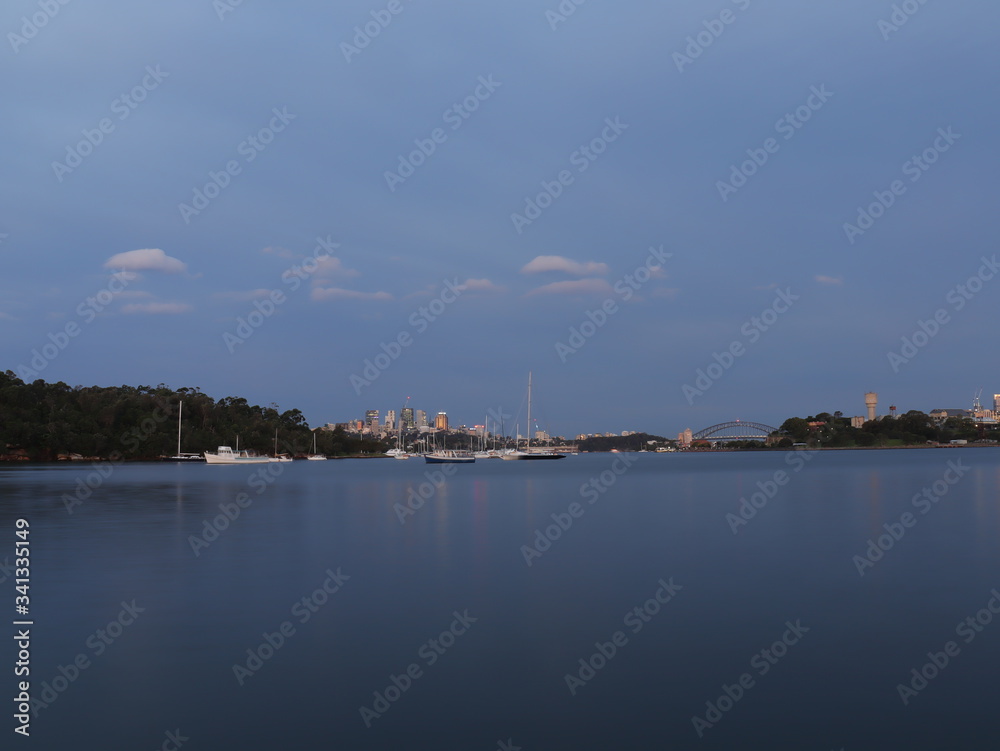 Drone Panoramic Aerial view of Sydney Harbour and the beautiful vibrant colours of the afternoon showing smooth harbour waters 