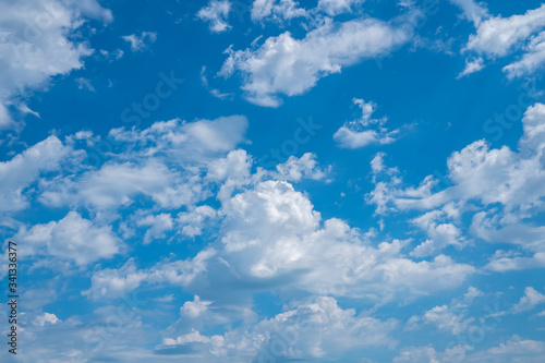 Blue sky background with white clouds, texture © k_samurkas