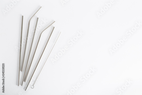 Reusable metal straws for the drinks with a cleaning brush