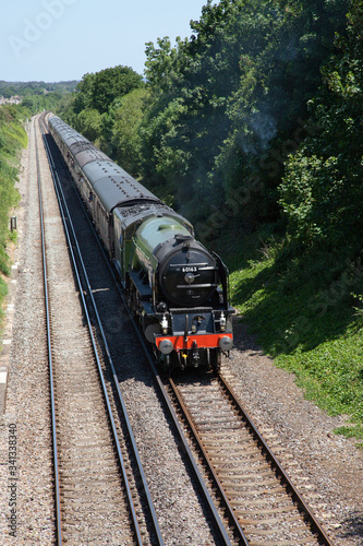 steam locomotive 60163 Tornado on a mainline excursion train near Wareham in England, UK photo