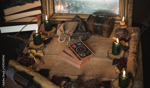 Tarot cards and esoteric concept. Magic rituals. Mystical table with details, 