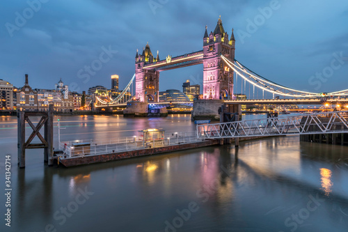 The famous landmark of London  the Tower Bridge and the Themes by night