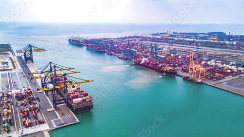 Photography Cargo ship, loading and unloading goods at the deep sea port