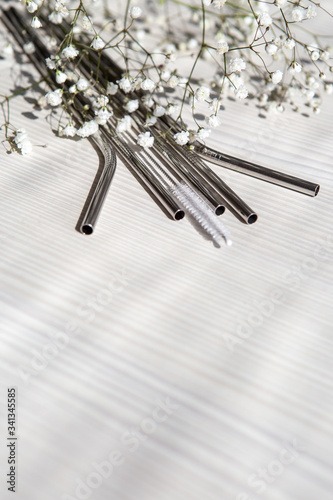 Reusable metal straws for the drinks with a cleaning brush