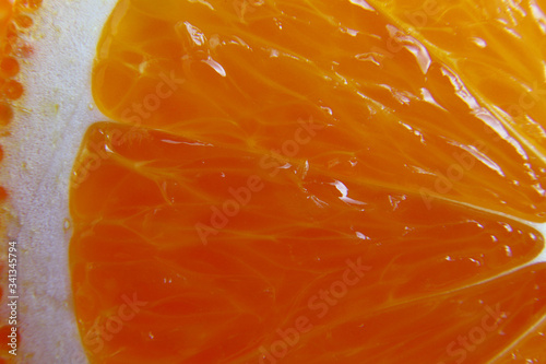 Macro photography of a fresh, ripe, juicy, sweet orange.