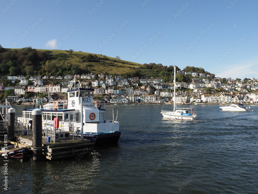 Dartmouth passenger ferry, one of three separate ferry services in the area, docked in Dartmouth, Devon, UK Dartmouth passenger ferry, one of three separate ferry services in the area, docked in Dartmouth, Devon, UK