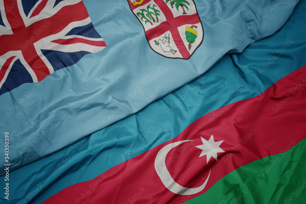 waving colorful flag of azerbaijan and national flag of Fiji . waving colorful flag of azerbaijan and national flag of Fiji .