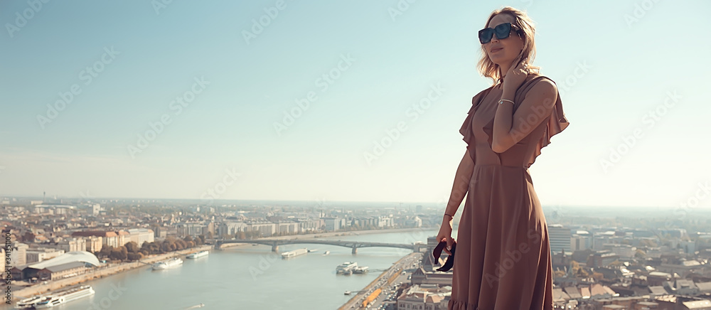 Budapest summer girl, panoramic view of the capital of Hungary, Danube bridge, Gelert hill