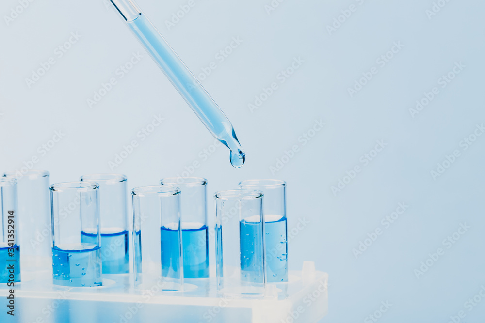A pipette that adds fluid to one of several tubes. Lab tests