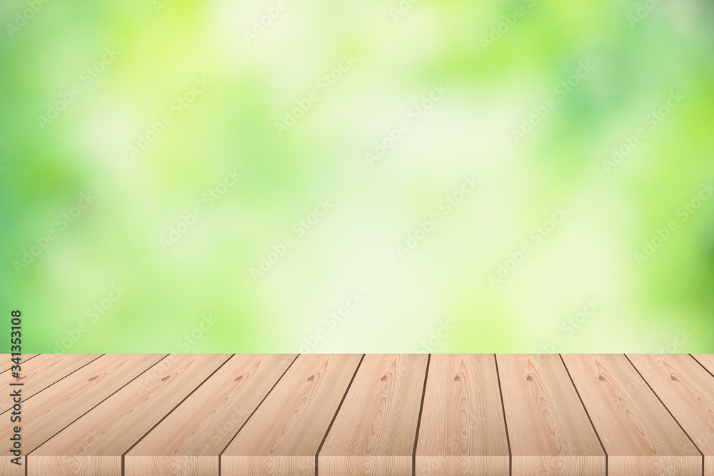 Empty wood plank table top with blur park green nature background bokeh light,Mock up for display or montage of product,Banner or header for advertise on social media,Spring and Summer concept.