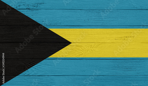 Bahamas flag on a wooden texture. Wood texture, planks Wooden texture background flag. Flag painted with paints on wood