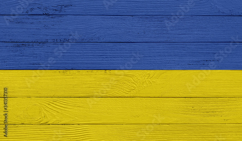 Ukraine flag on a wooden texture. Wood texture, planks Wooden texture background flag. Flag painted with paints on wood