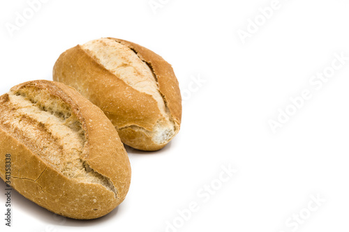 Baked small breads isolated on white background. Copy space