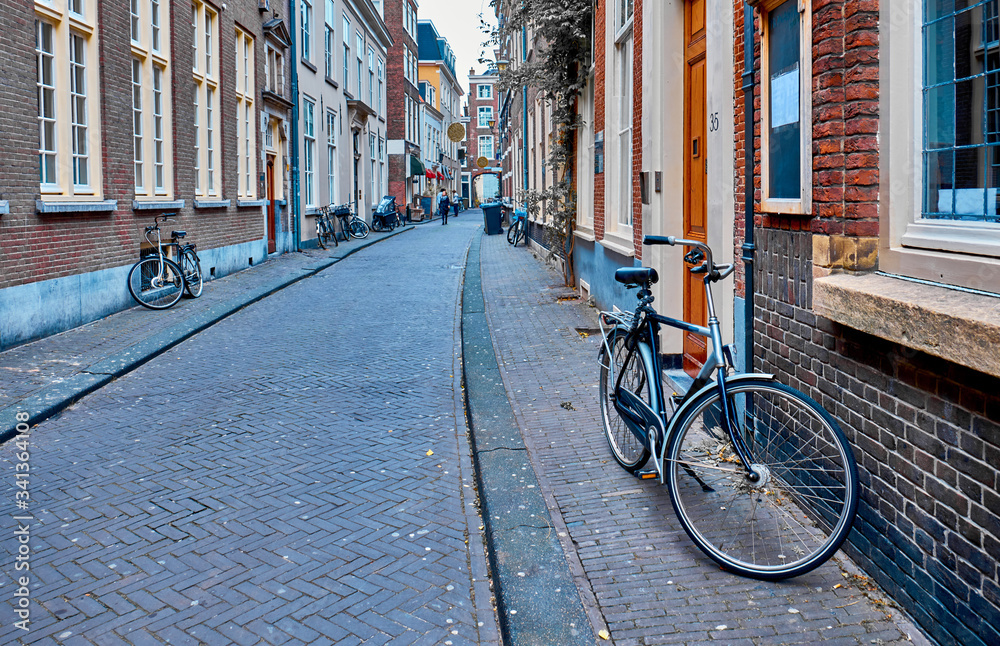 Narrow stone street in The Hague, Netherlands. Narrow stone street in The Hague, Netherlands.