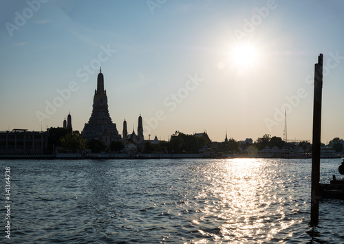 Wat Arun, Chao Phraya River, sun,  Boat,Reflex