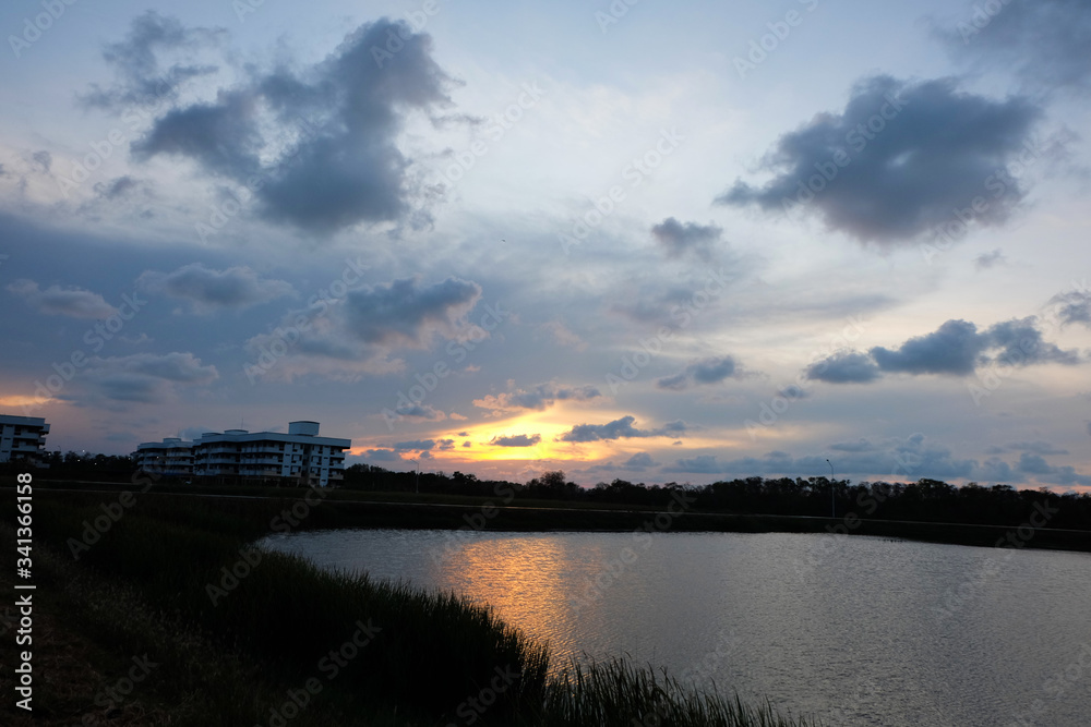 Obraz premium sunset over the river