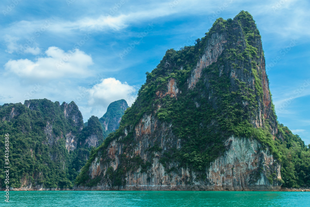 mountains lake river sky and natural attractions in Ratchaprapha Dam at Khao Sok National Park, Surat Thani Province, Thailand.