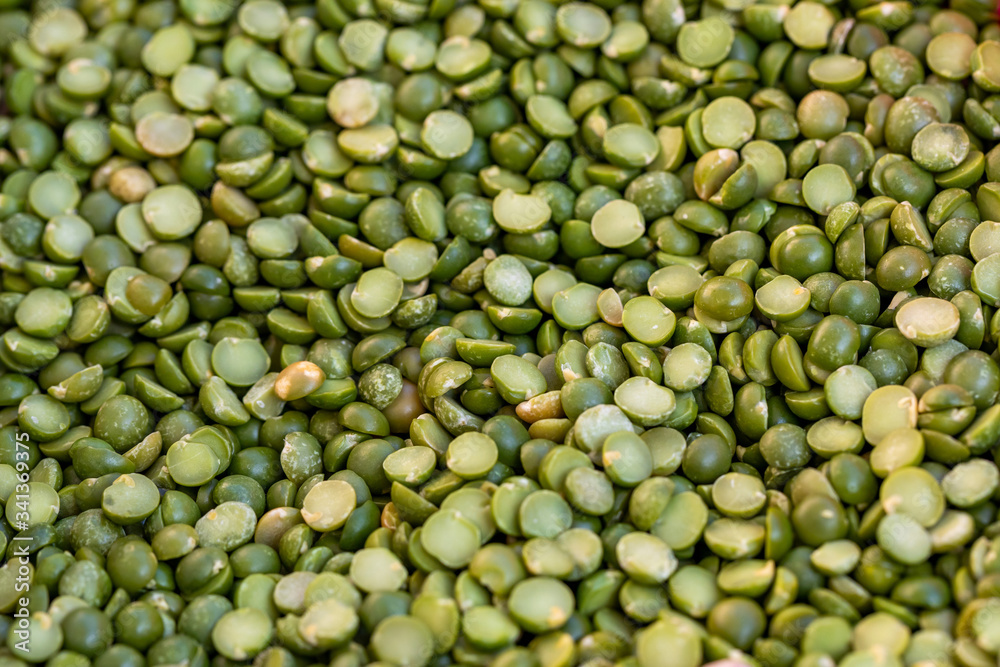 Background of dread green peas, closeup, food street , market