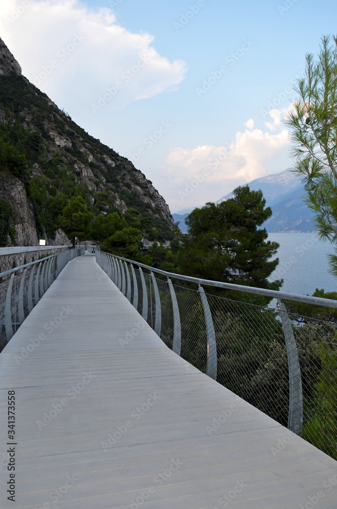 Obraz premium Terraced bike path over Lake Garda. Ciclopista del Garda. Limone sul Garda, Italy