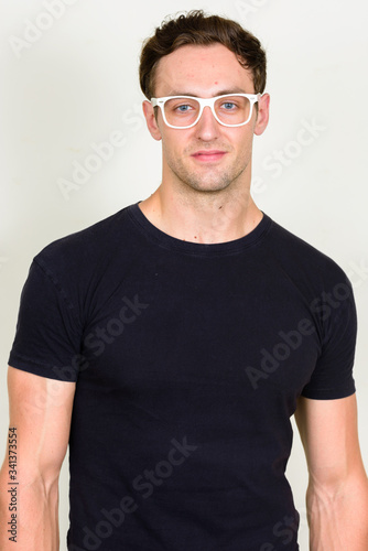 Portrait of young handsome man with eyeglasses © Ranta Images