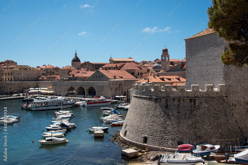 Views of the stone wall and the harbor in Dubrovnik, Croatia, Europe.