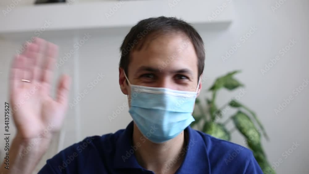 A man in a blue shirt mask coronavirus A man in a blue shirt mask coronavirus