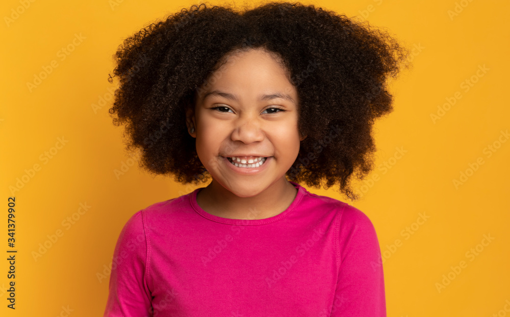 Portrait Of Funny Cute African American Little Girl Laughing At Camera - obrazy, fototapety, plakaty 