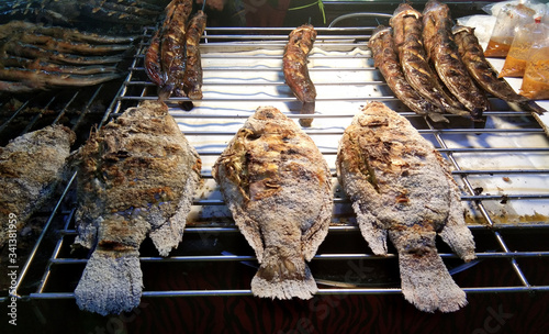 Grilled Tilapia That were laid with steel gratings and other types of grilling yards Ready for sale.