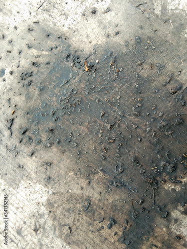 Dirty debris, oil stains and insects that leave stains on the paper crates, Oil stains on cardboard. Cheap oil leak absorbing, abstract background.