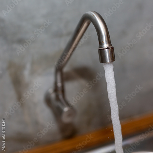 Water drop from faucet