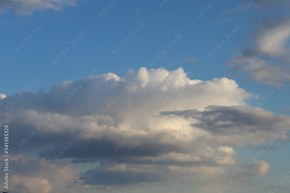 The evening sky after the rain. Spring sky with clouds. The evening sky after the rain. Spring sky with clouds.