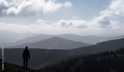 Man hiker on a top of a mountain   Aiako Harriak natural park  Euskadi