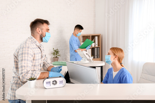 Female receptionist working...