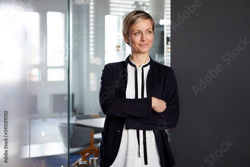 Wallpaper Mural Portrait of confident businesswoman in office Torontodigital.ca