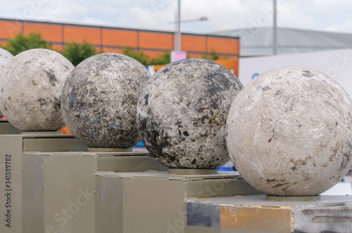 Принти на полотні Atlas Stones on their podiums at a Strongman Contest