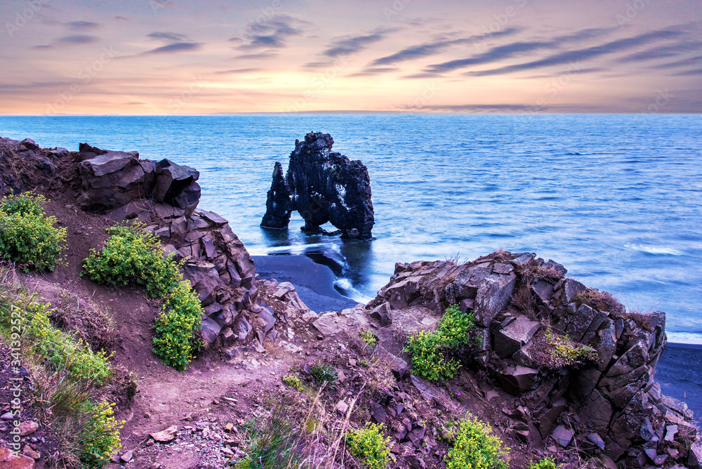 Beautiful dramatic landscape with extraordinary rock formation Hvitserkur on Vatnsnes peninsula in North-West Iceland. Exotic countries. Amazing places.