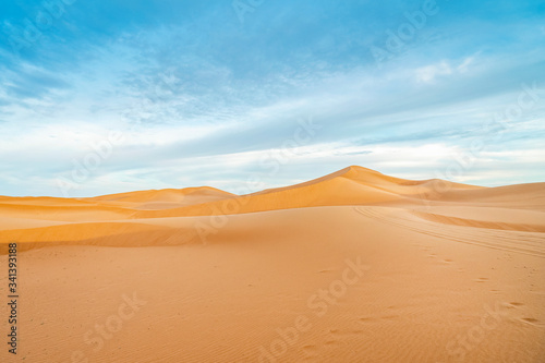 Peaceful landscape of Sahara Desert sand dunes, Morocco.