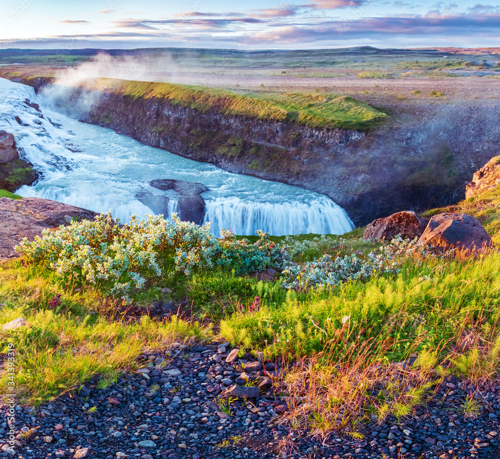 Magical charming bright colorful landscape with a famous Gullfoss waterfall in the sunrise in Iceland. Exotic countries. Amazing places. Popular tourist atraction. (Meditation, antistress - concept).