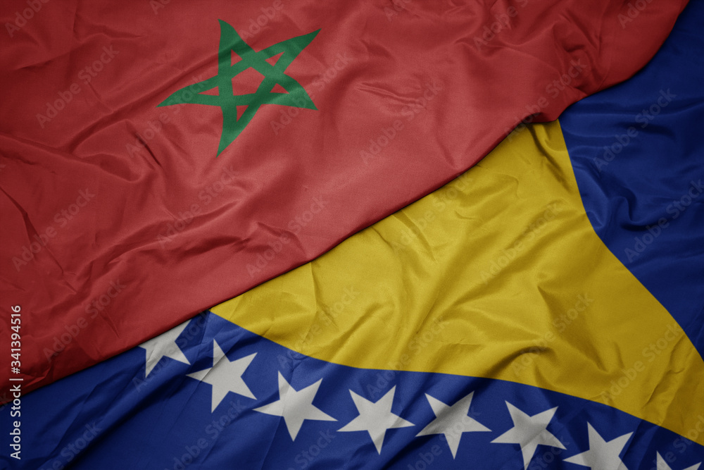waving colorful flag of bosnia and herzegovina and national flag of morocco. waving colorful flag of bosnia and herzegovina and national flag of morocco.