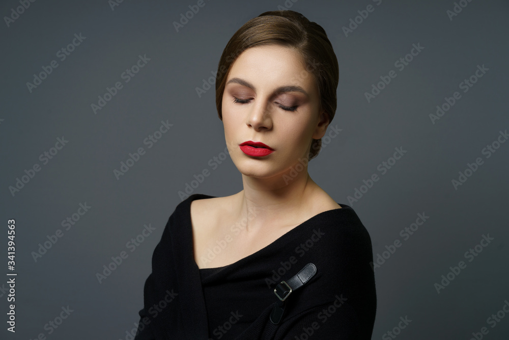 Teenage Girl with bright makeup next to grey background with flares Teenage Girl with bright makeup next to grey background with flares