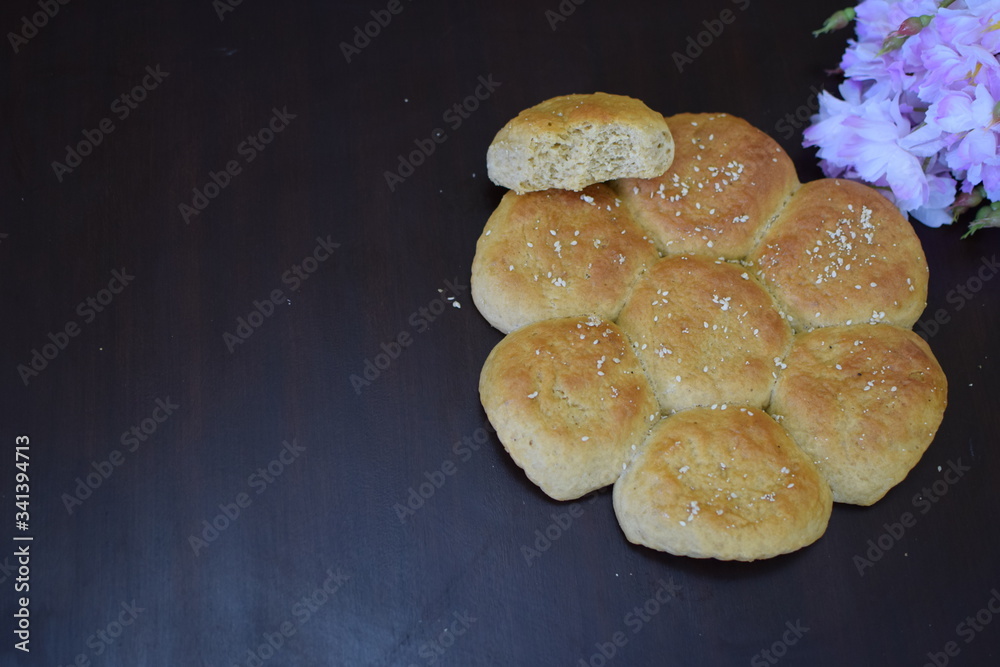 Whole Wheat buns with wooden background