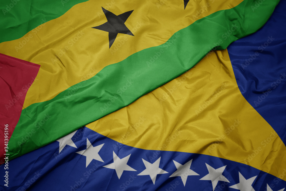waving colorful flag of bosnia and herzegovina and national flag of sao tome and principe . waving colorful flag of bosnia and herzegovina and national flag of sao tome and principe .