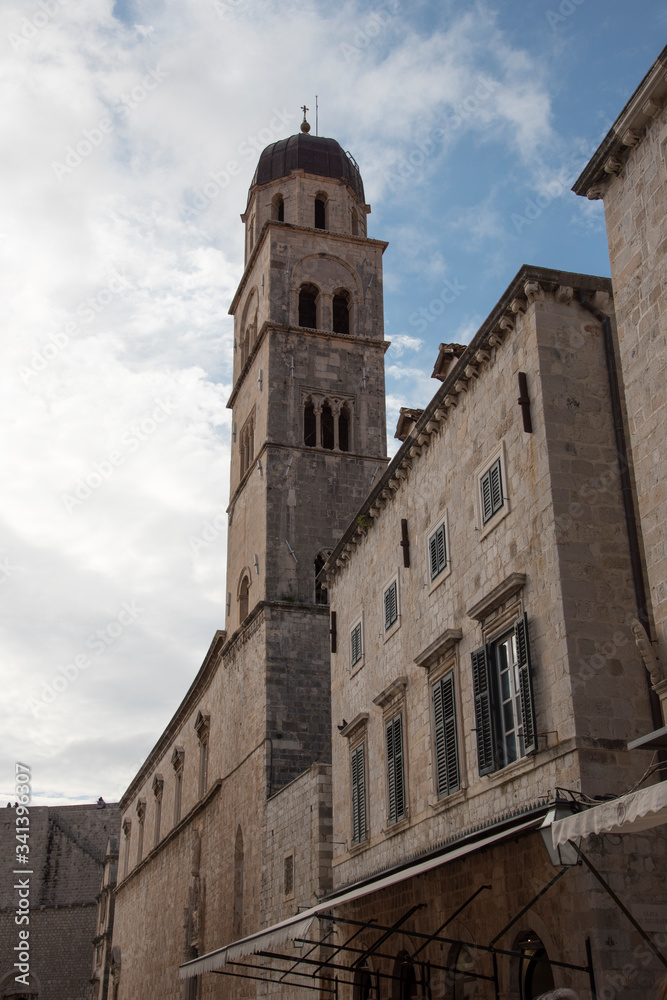 Stone facade and tower, from one of the main streets in Dubrovnik, Croatia, Europe.