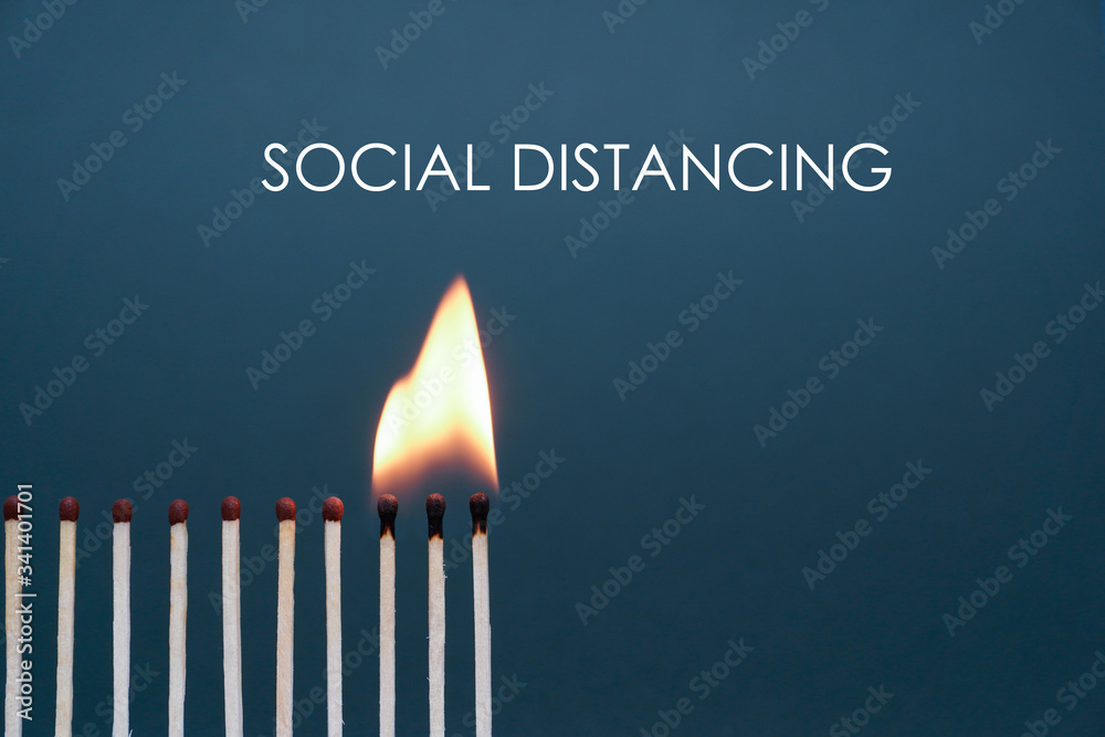 Maintain a distance between you and other people. Social distancing concept using burnt out match sticks as a metaphor for containing coronavirus or any virus or pandemic outbreak. Stay at home Maintain a distance between you and other people. Social distancing concept using burnt out match sticks as a metaphor for containing coronavirus or any virus or pandemic outbreak. Stay at home