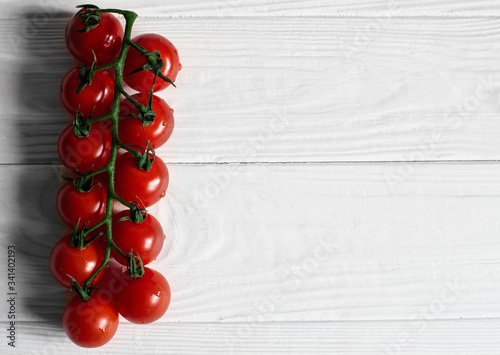 Tomatoes on wooden background