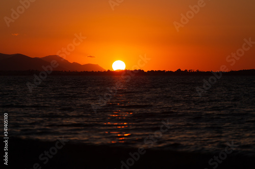 Sunset in Greece with the ocean in front