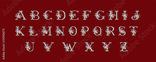 Geometric latin alphabet with flowers. Embroidery retro style.