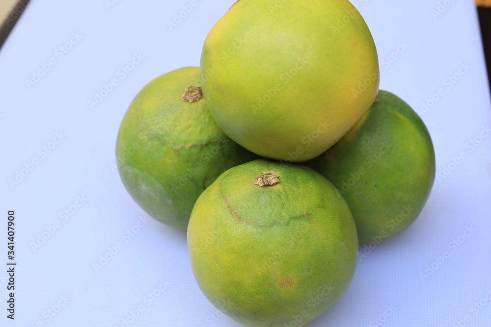 Yellow and green color whole ripe Sweet lime fruits or Citrus limetta Yellow and green color whole ripe Sweet lime fruits or Citrus limetta