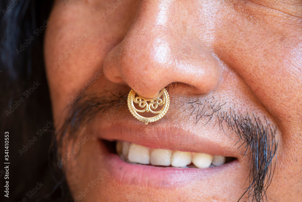 Ταπετσαρία Portrait of young hispanic man with long hair wearing a metal septum piercing at
